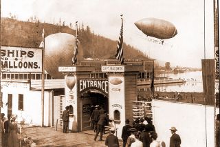 Library of Congress##Aviation pioneer Thomas Scott Baldwin’s airship returns from a trip over the Exposition grounds during the 1905 Lewis and Clark Centennial Exposition. The hillsides that Lafe Pence dreamed of moving into the lake are visible to the left. Library of Congress##Aviation pioneer Thomas Scott Baldwin’s airship returns from a trip over the Exposition grounds during the 1905 Lewis and Clark Centennial Exposition. The hillsides that Lafe Pence dreamed of moving into the lake are visible to the left.