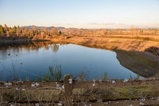 Rusty Rae/News-Register##The quarry pond on Fox Ridge is one of the many privately owned parcels in the area. Despite the planning commission recommending approval of an area plan, development is dependent on landowners annexing property into the city.
